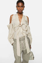 Cut-out blouse with bow