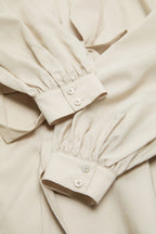 Cut-out blouse with bow